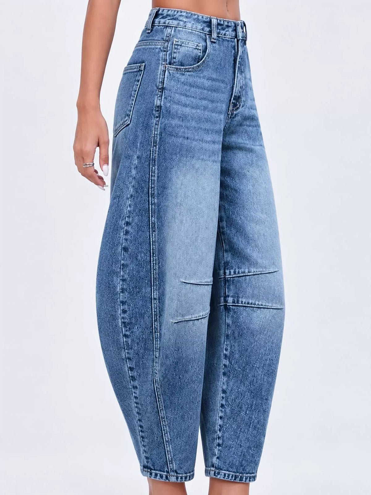 Blue barrel-leg jeans, side view