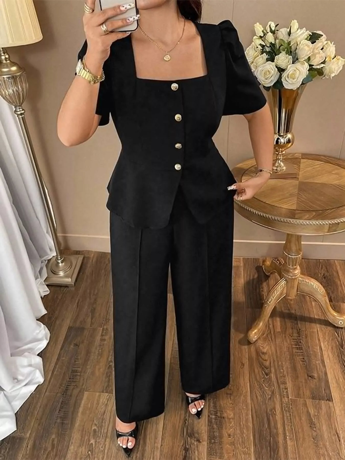 Peplum top and pants set, black front