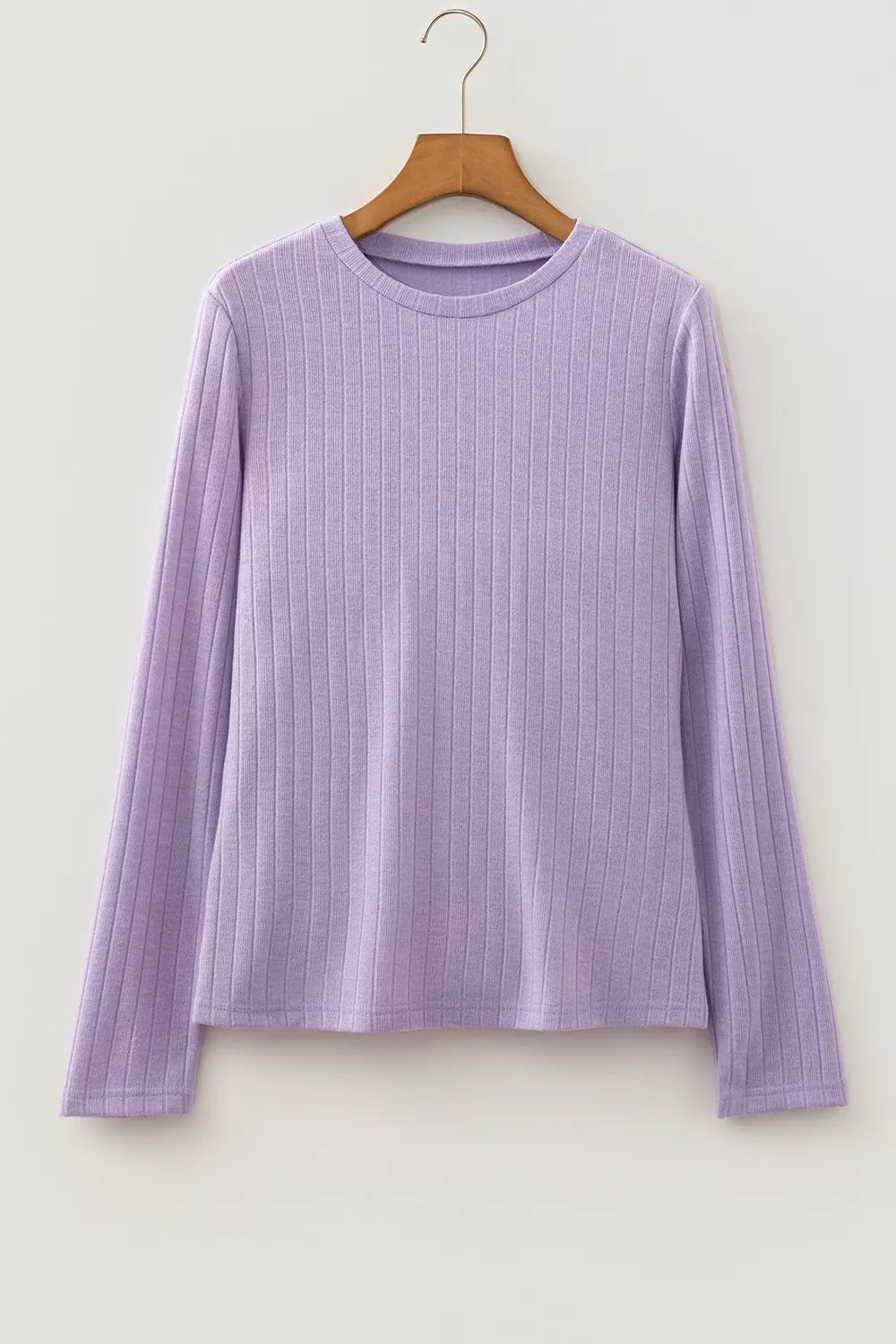 Purple ribbed long sleeve top, front on hanger