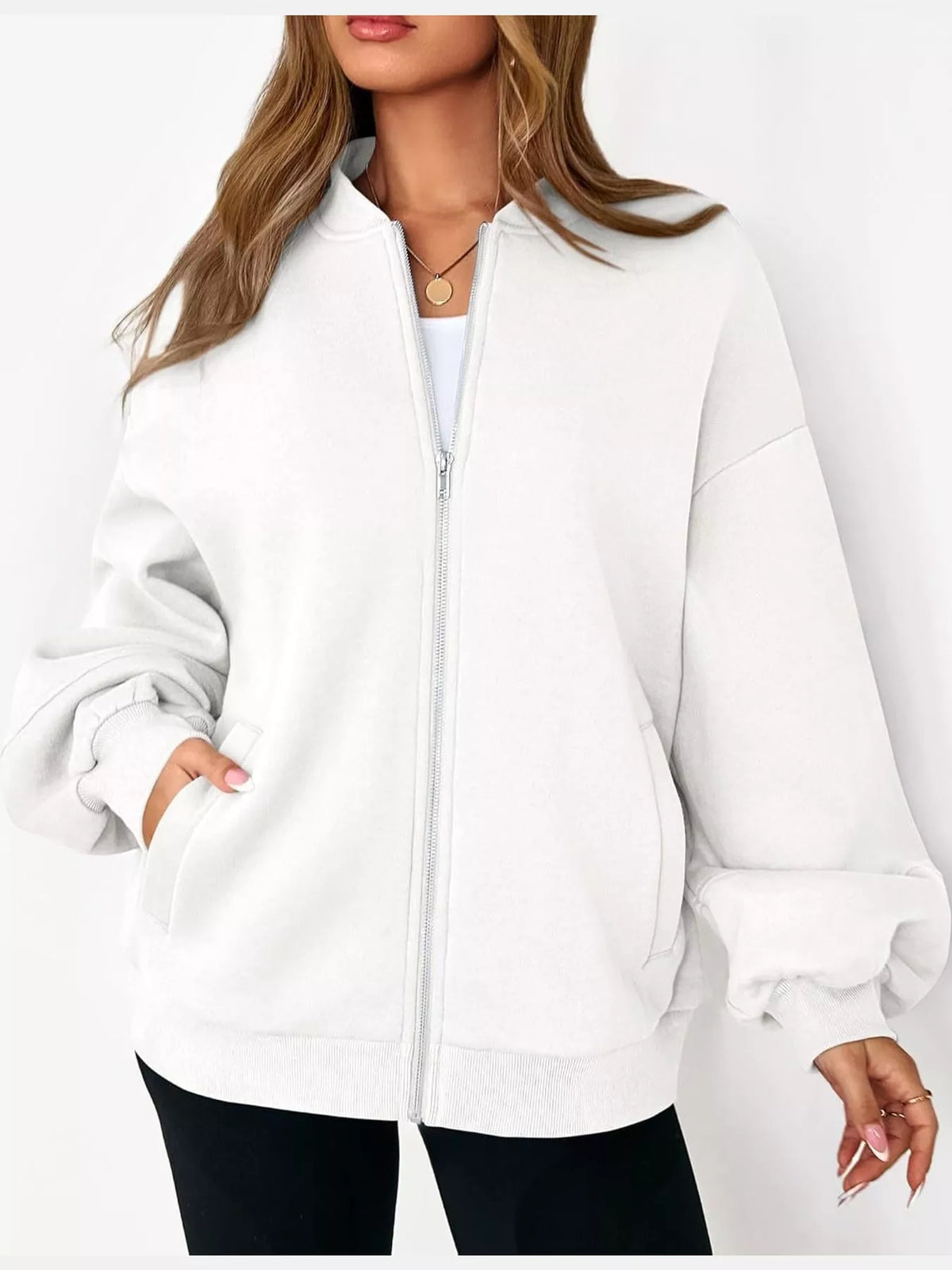 White oversized zip-up jacket — front view