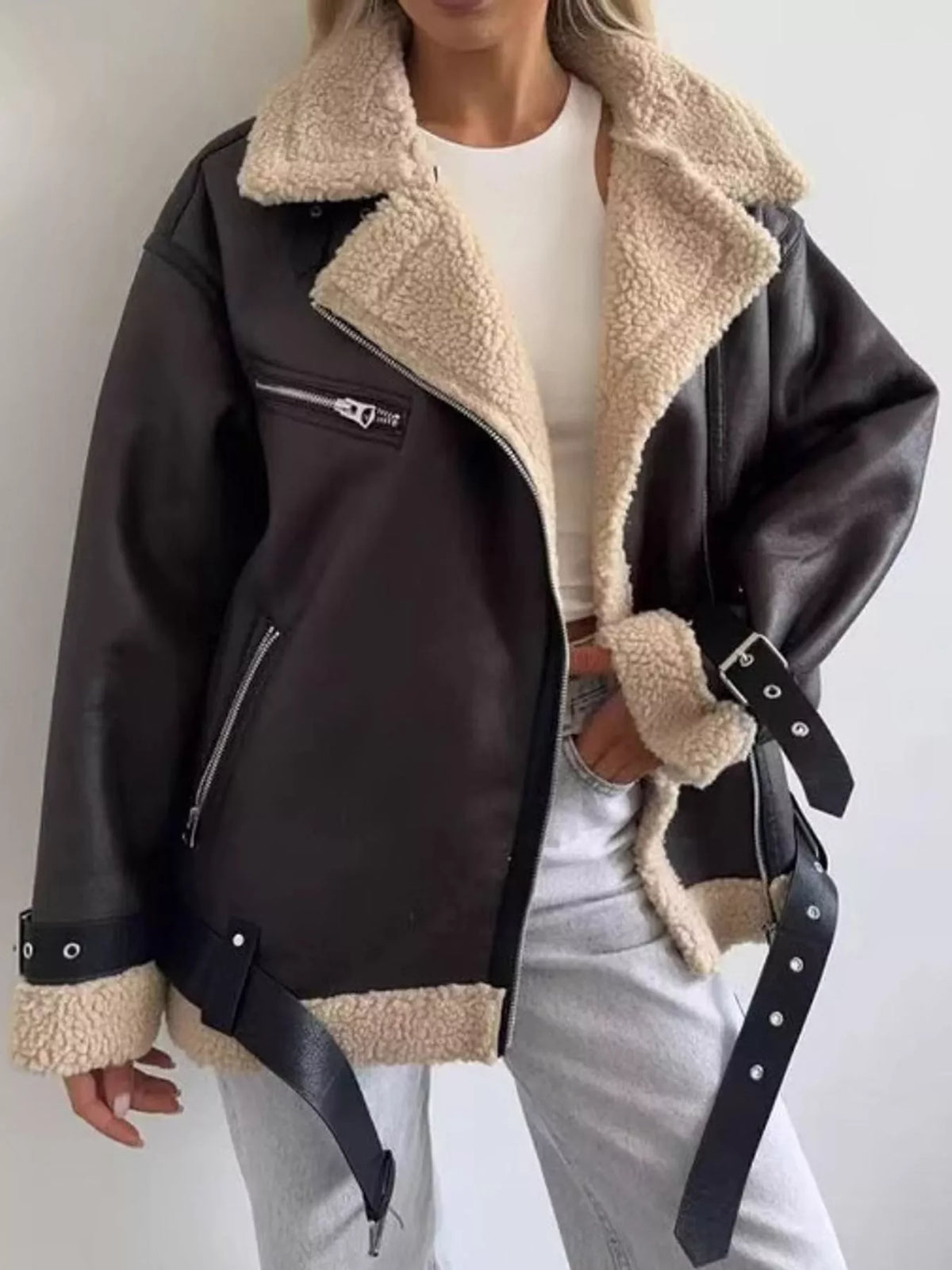 Black with cream trim faux leather zip up jacket, front view