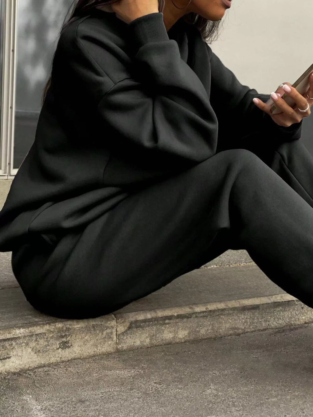 Half-zip top and pants set, black seated side