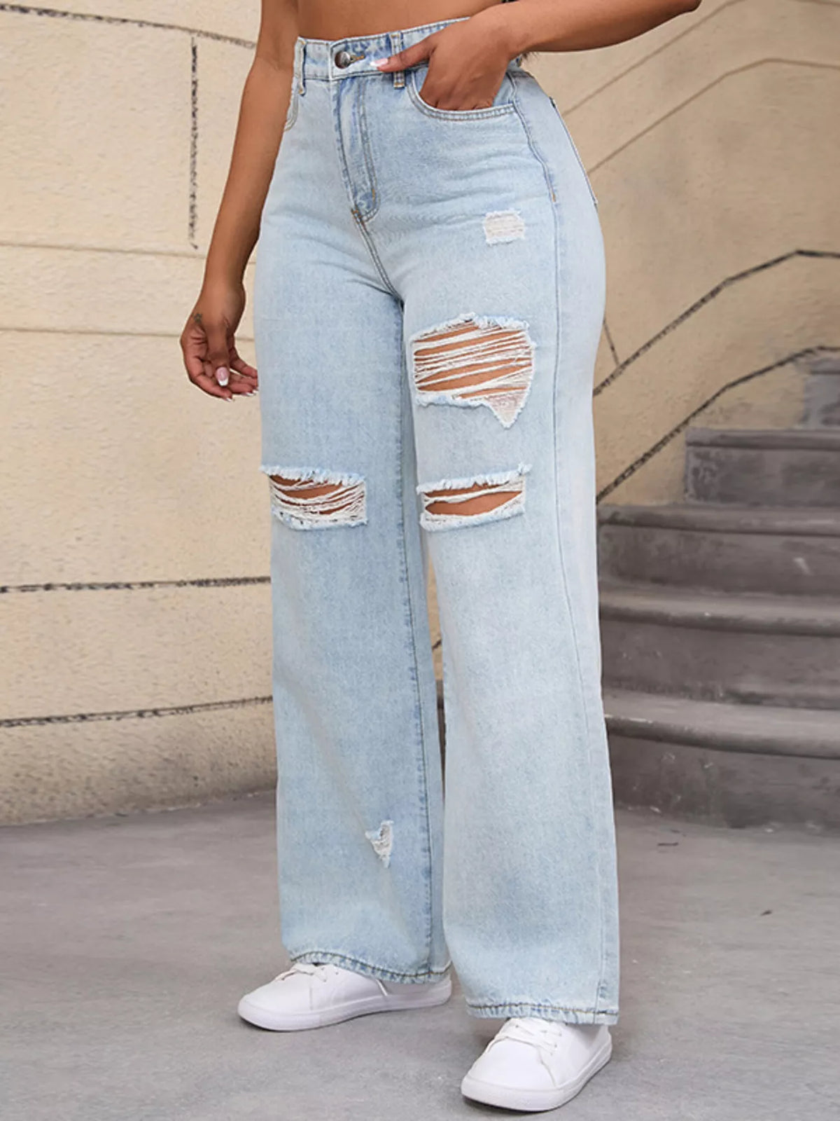 Light blue distressed wide-leg jeans, front side view