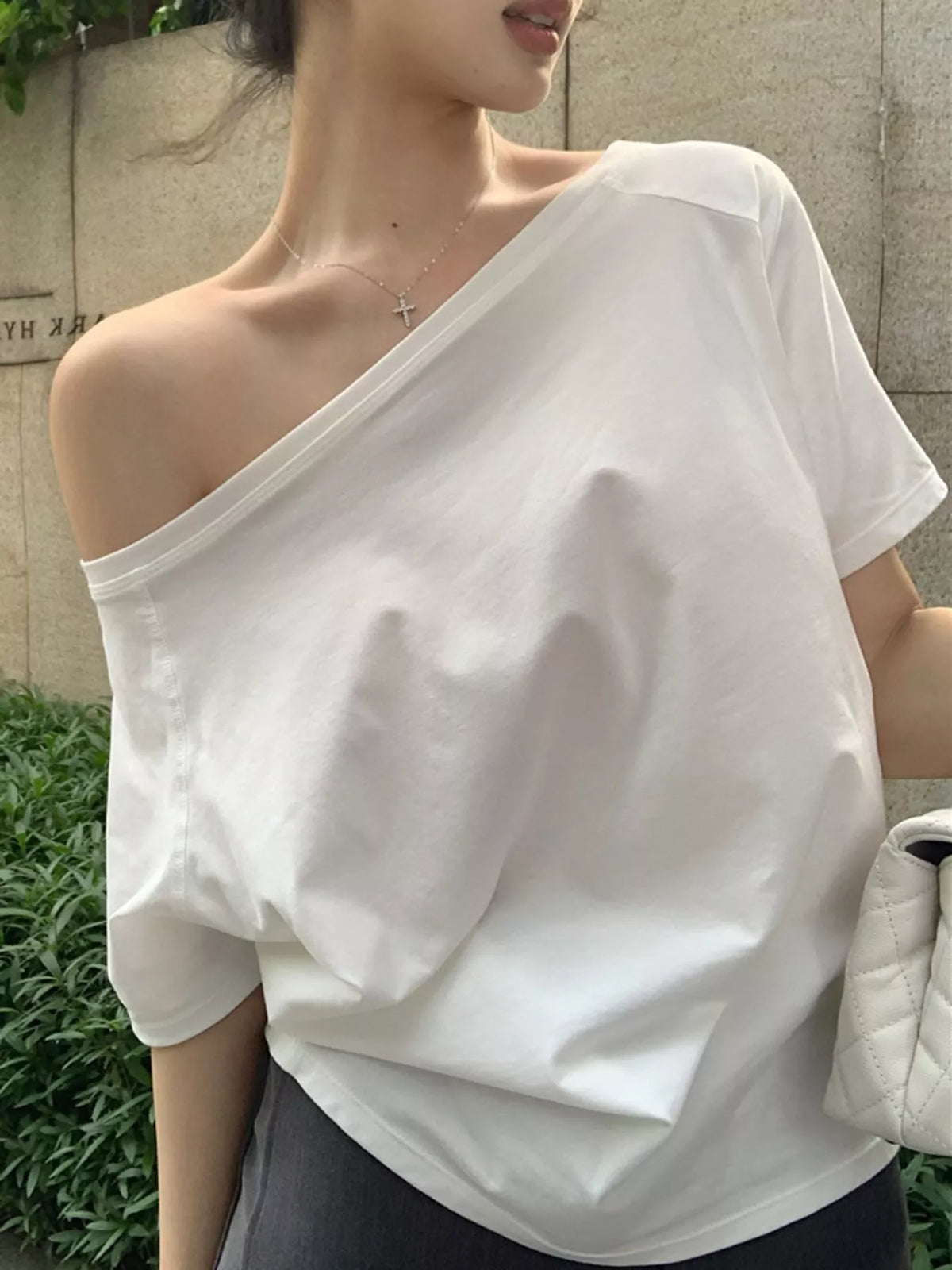 White asymmetric-neck T-shirt, front view