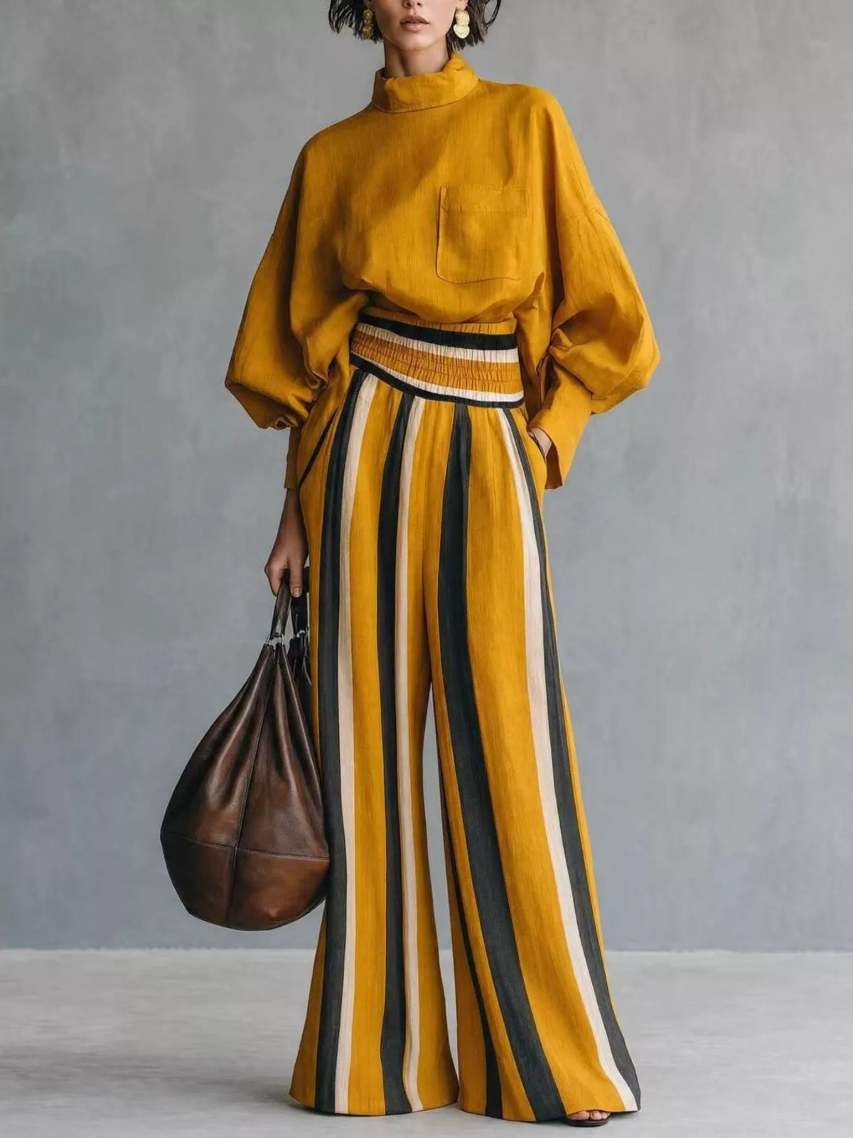Yellow mock-neck blouse and striped wide-leg trouser set — front view