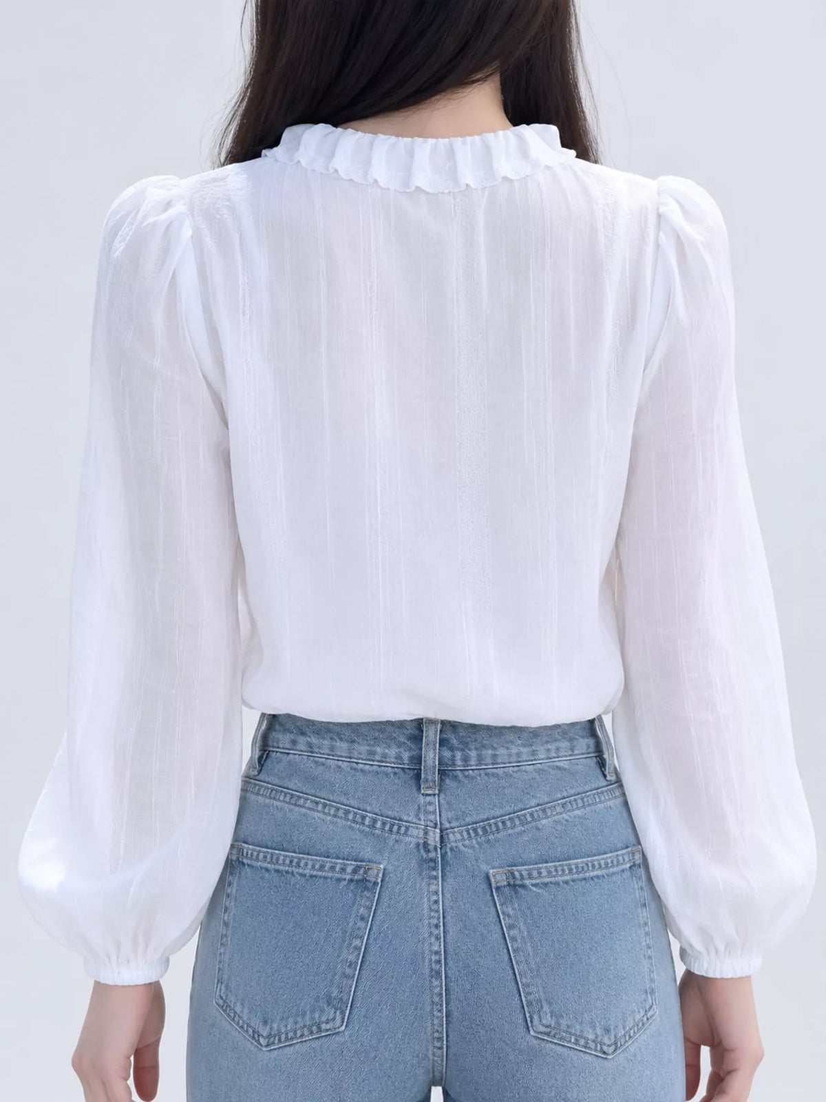 White - Lined lace-trimmed ruffle tie-neck blouse, back view