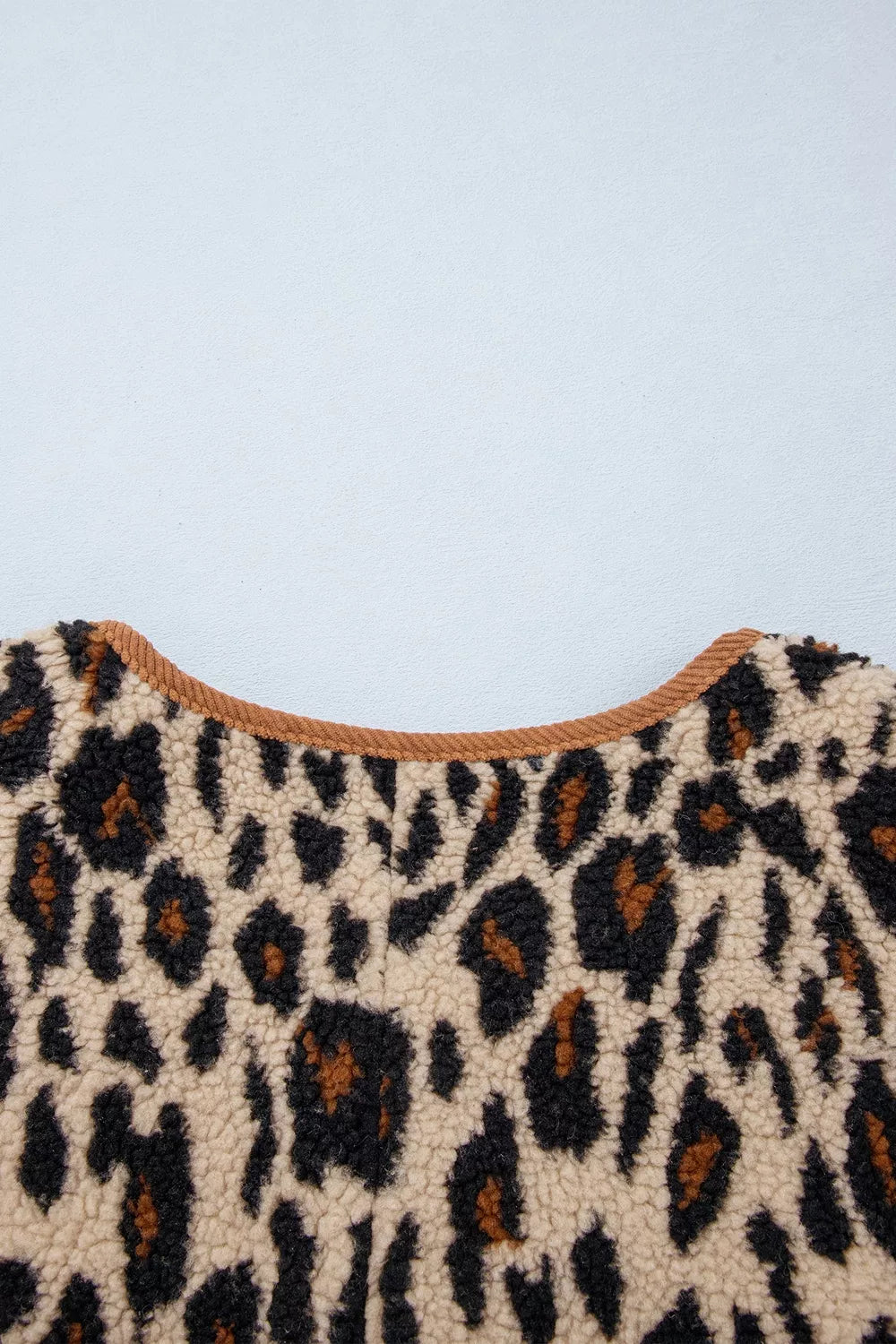 Leopard plush jacket with brown corduroy trim, back neckline detail