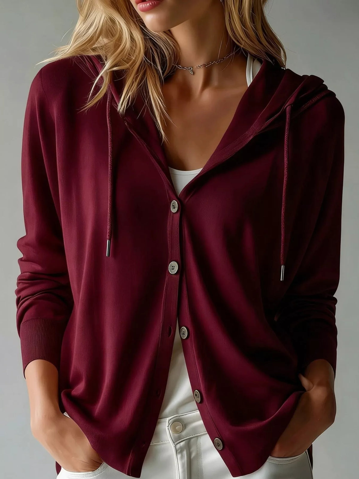 Hooded long sleeve cardigan, front view on model