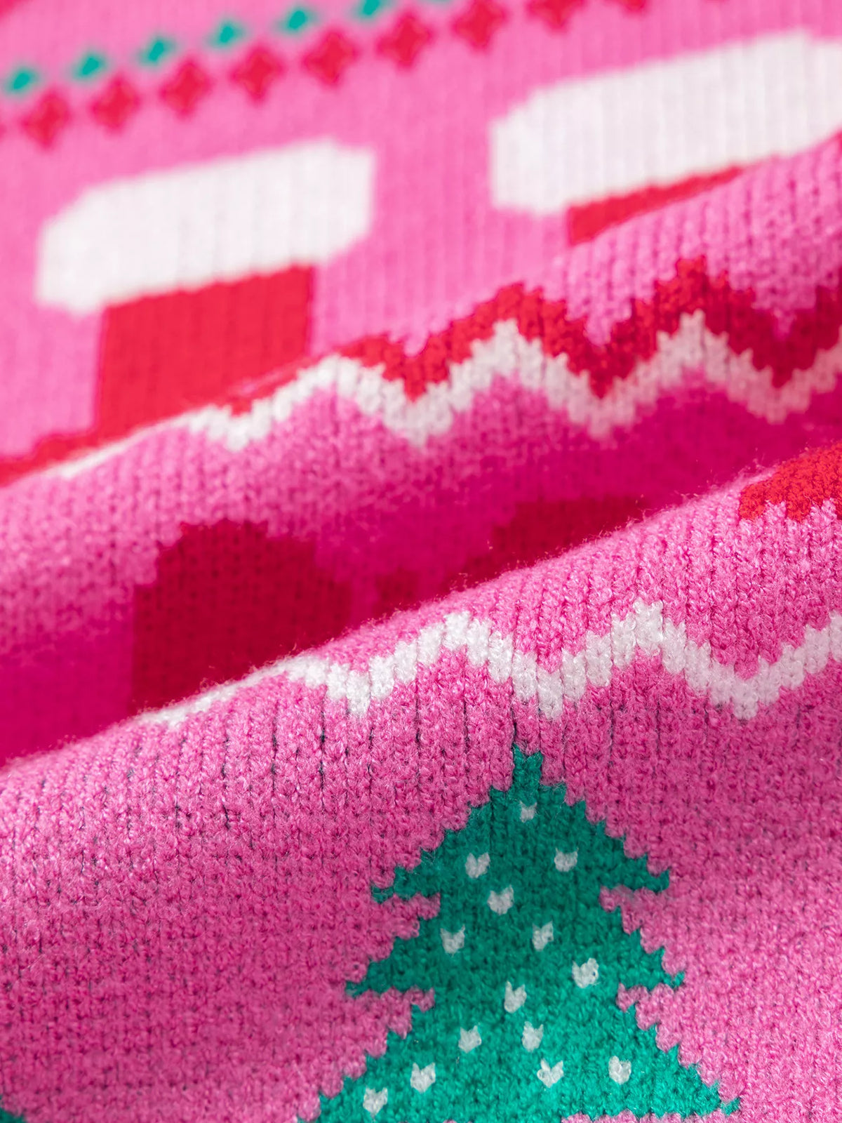 Pink Christmas graphic sweater, Christmas knit close-up