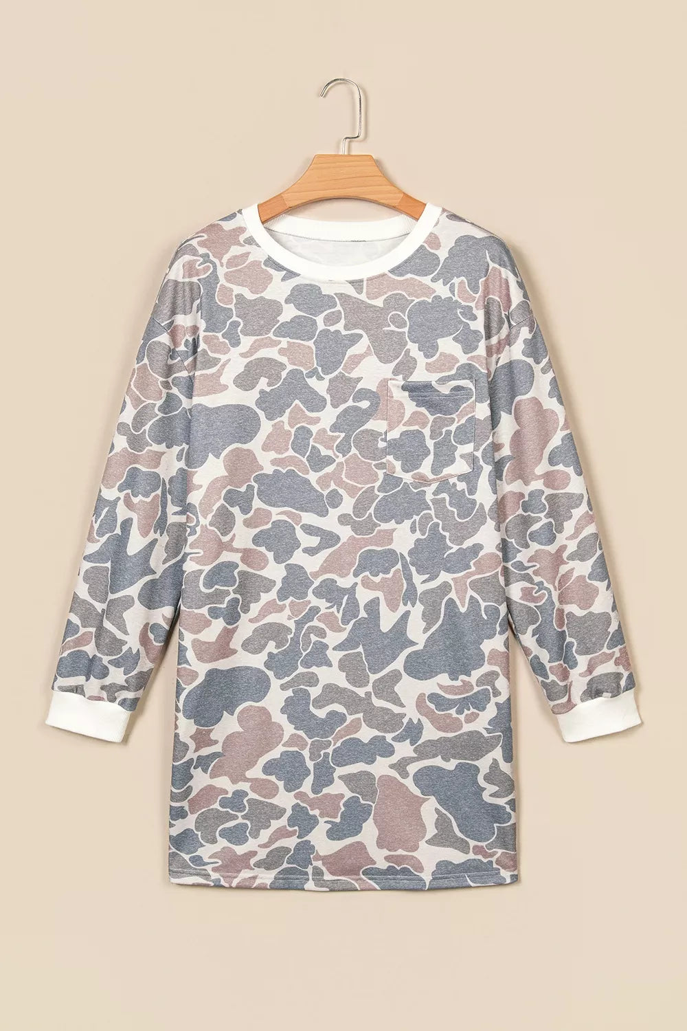 Gray and beige botanical camo mini dress with white ribbed cuffs and side pockets, front view