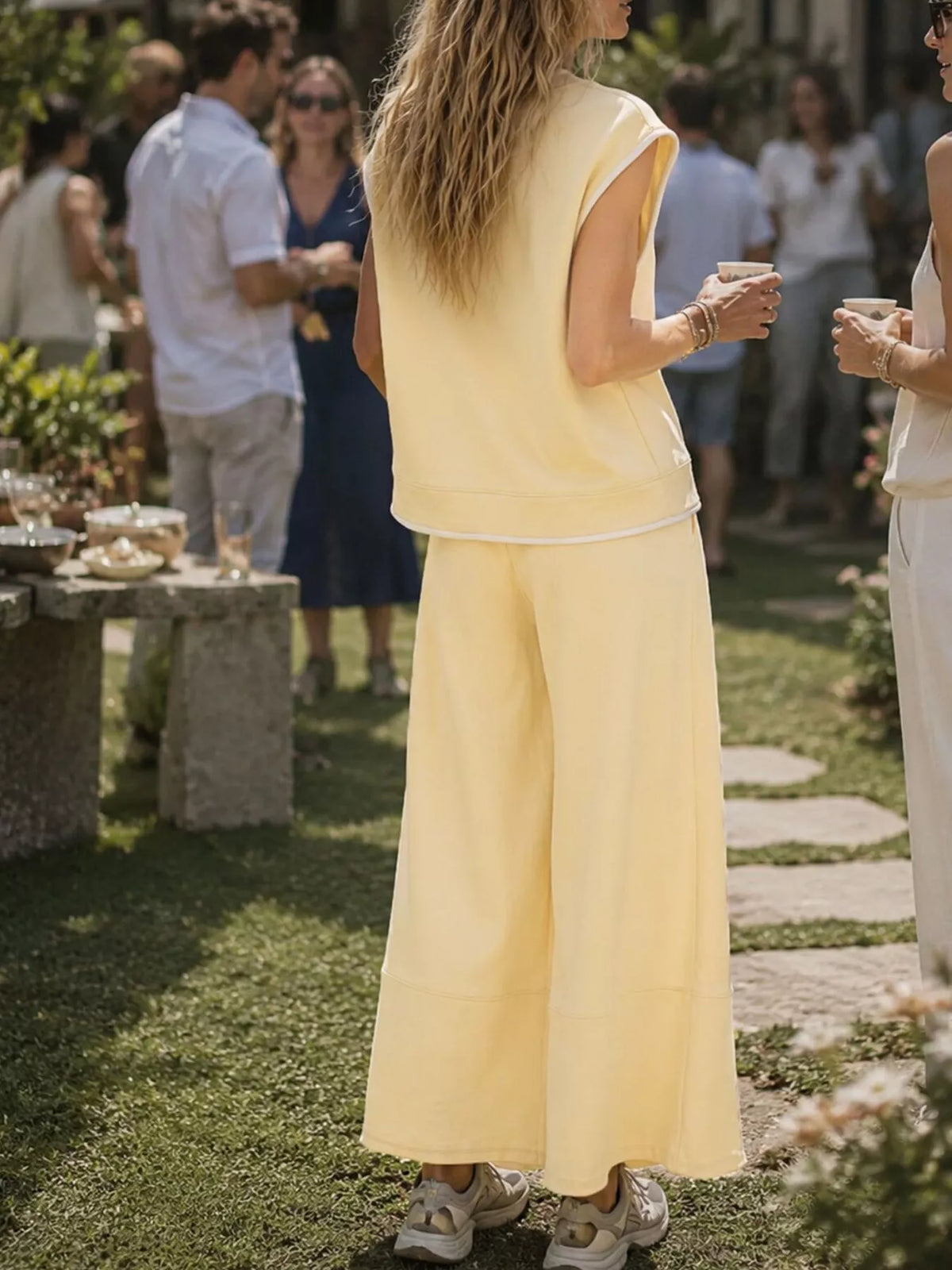 Yellow sleeveless top and cropped pants set, back view