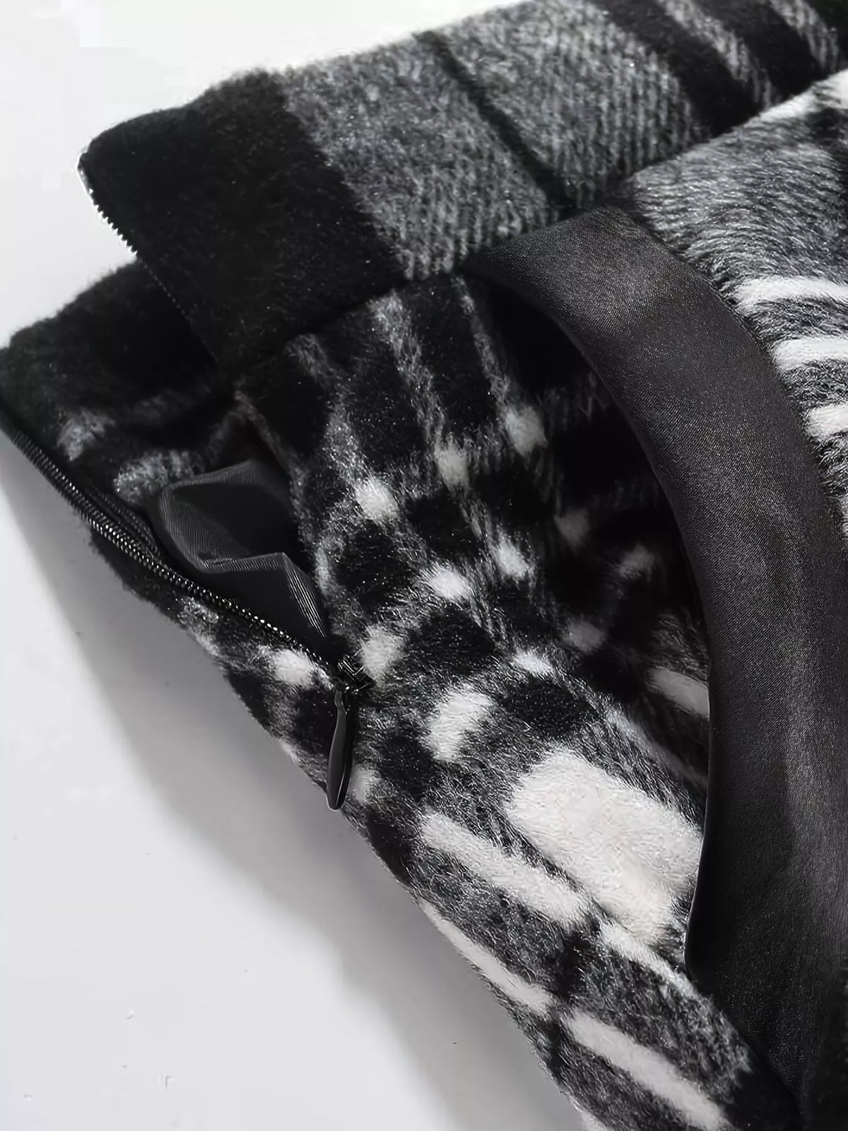 Black and white plaid A-line midi skirt, waist and zipper detail