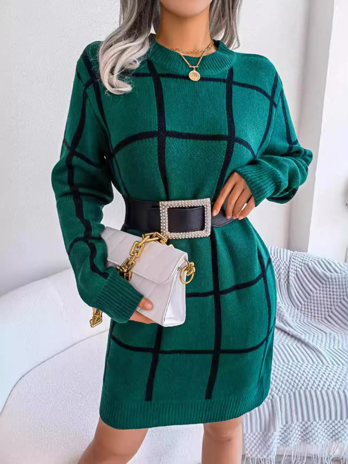 Green windowpane long-sleeve sweater dress, belted front with handbag.