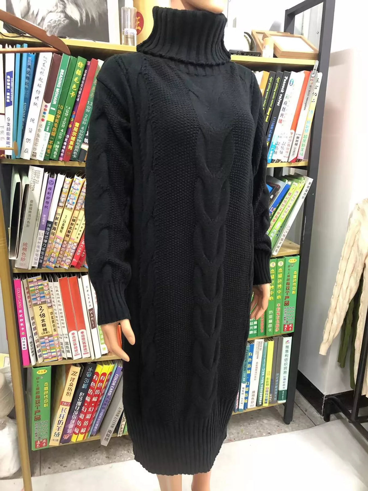 Black oversized cable knit turtleneck sweater dress