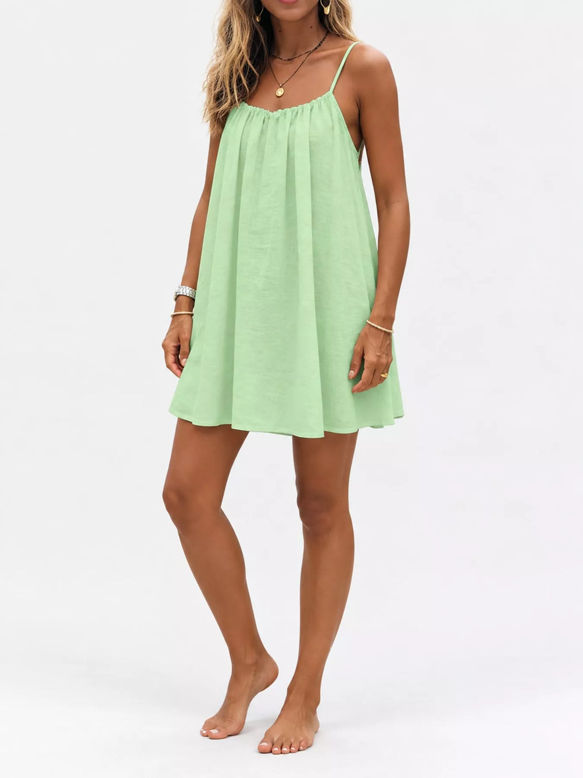 Light green spaghetti strap A-line mini dress with open tie back