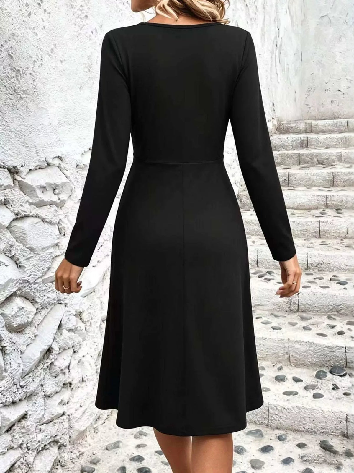 Black long sleeve ruched-front midi dress, back view