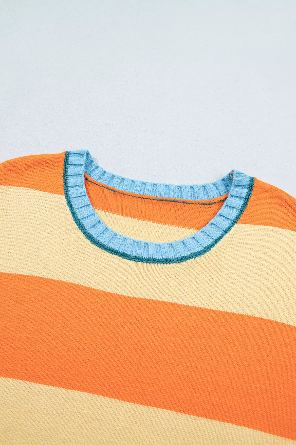 Striped colorblock sweater, blue neckline detail