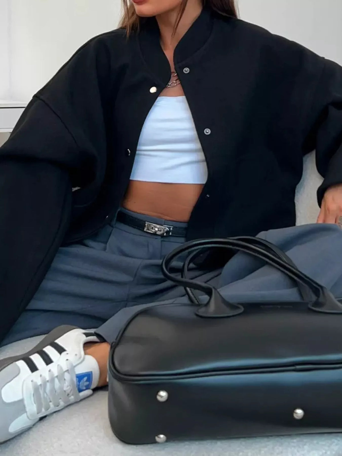 Black snap-button bomber jacket