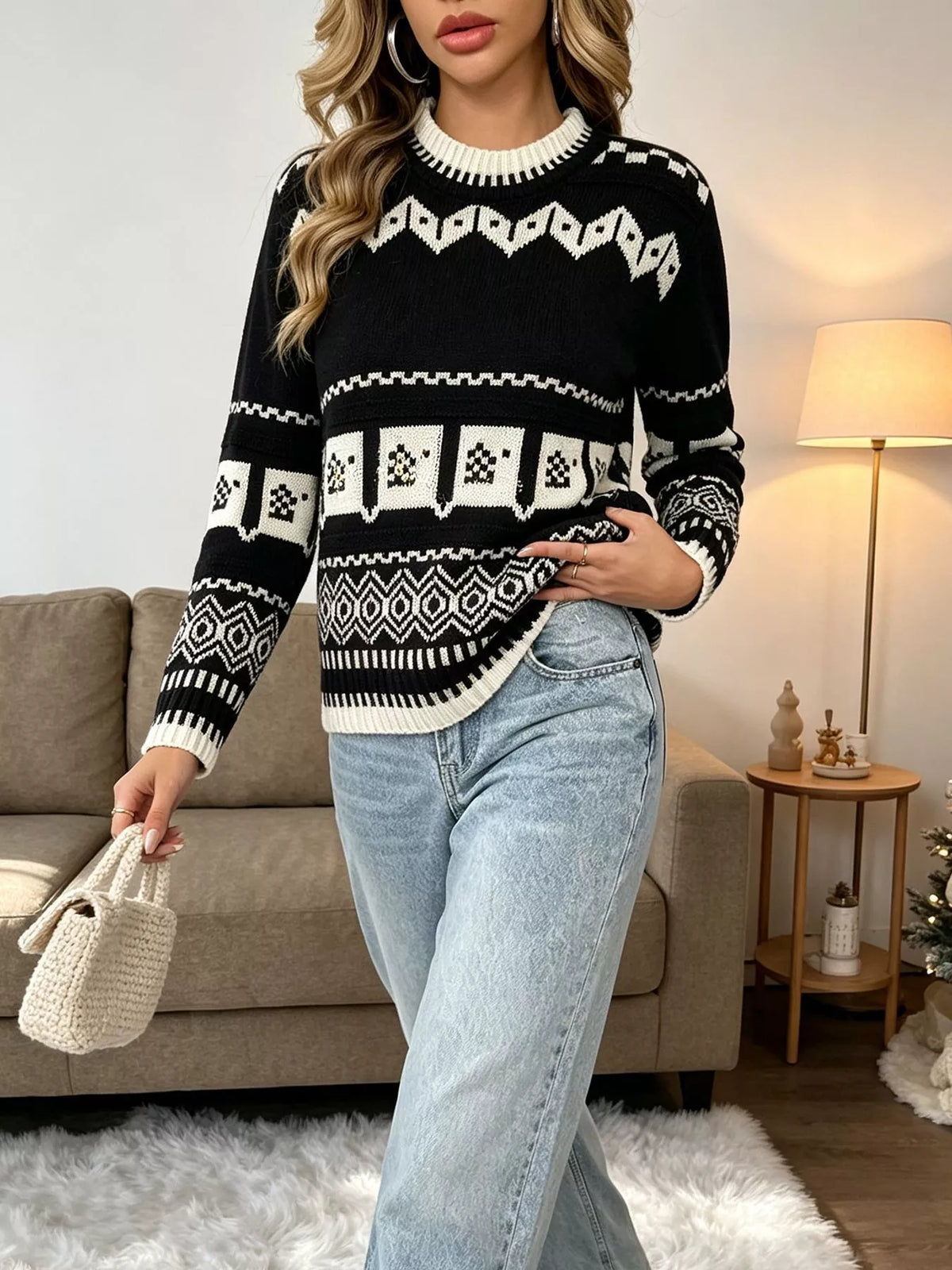 Black and white christmas fair isle crewneck sweater, full-length styled view.