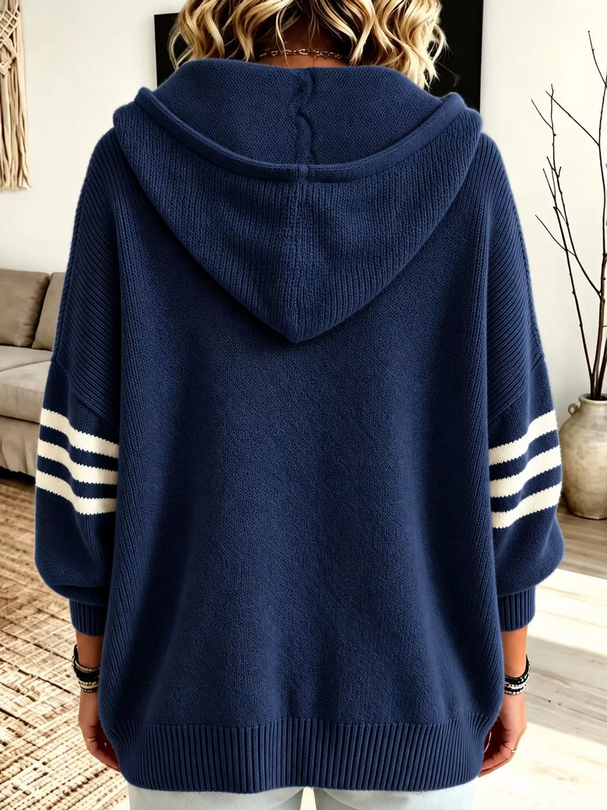 Navy hooded zip-up knit cardigan, back view
