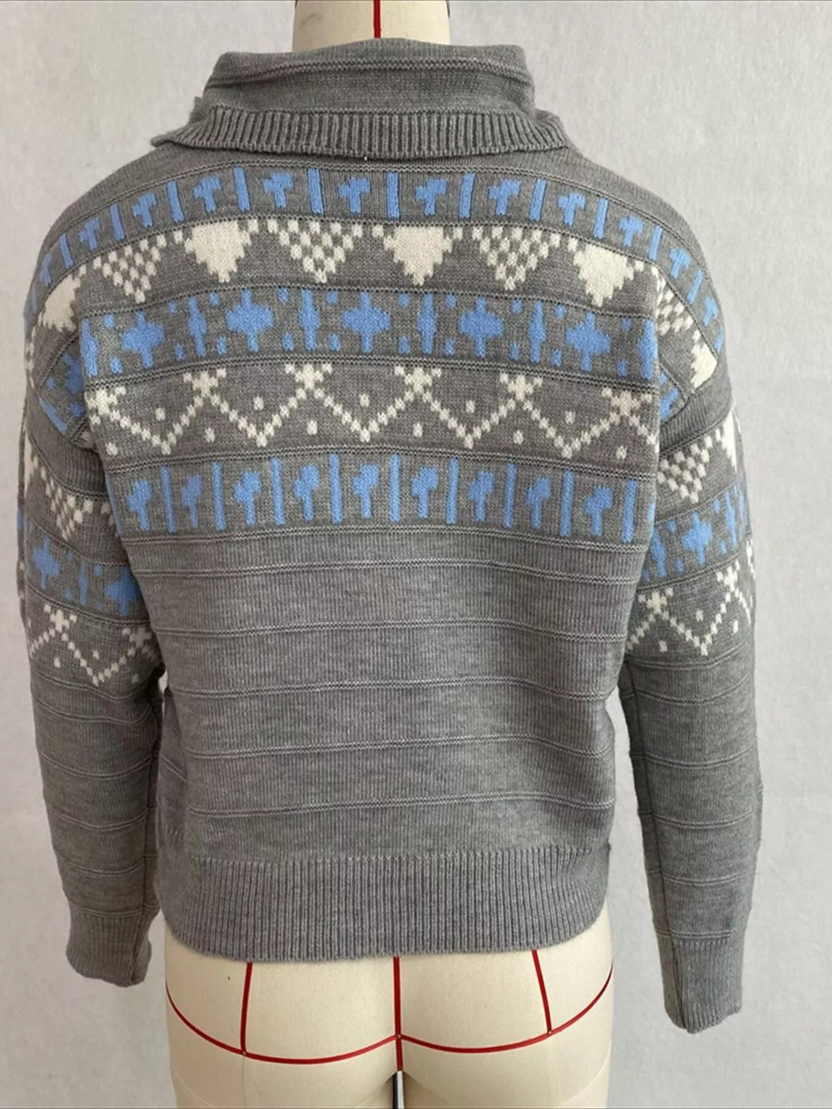 Gray fair isle polo-collar sweater, back on dress form.