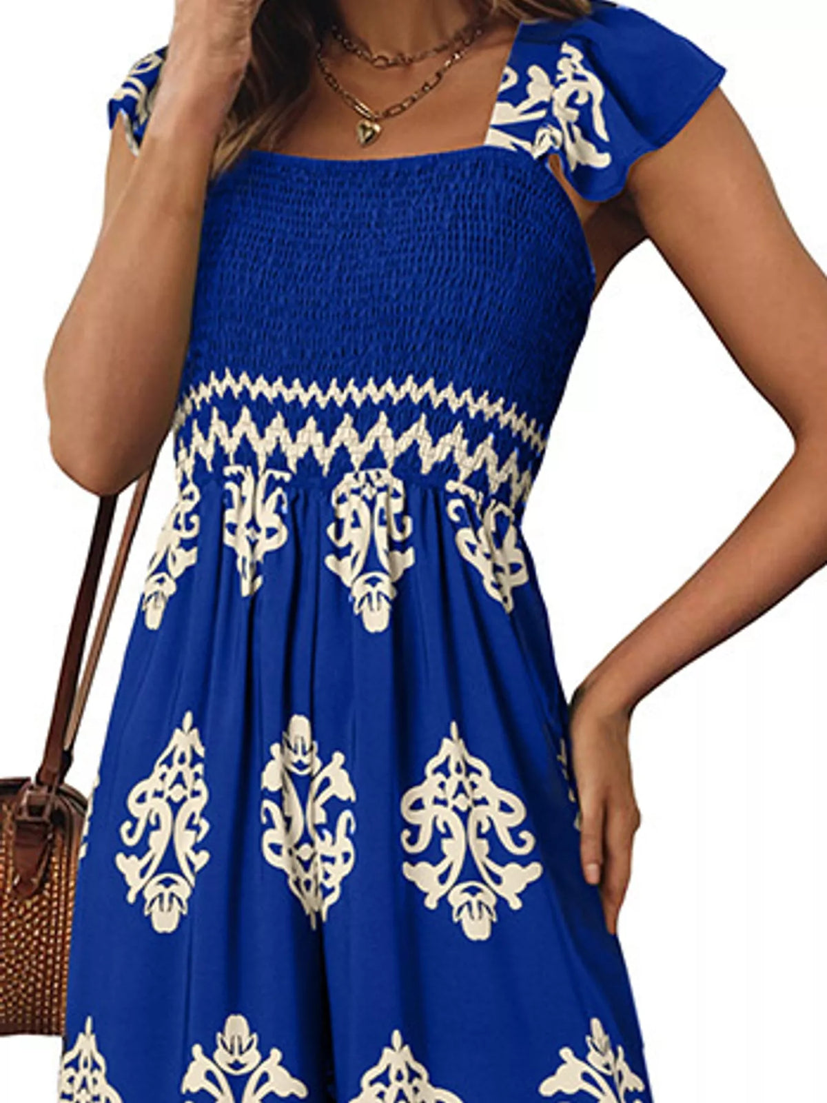 Wide-leg ornamental-print short-sleeve jumpsuit, garment detail