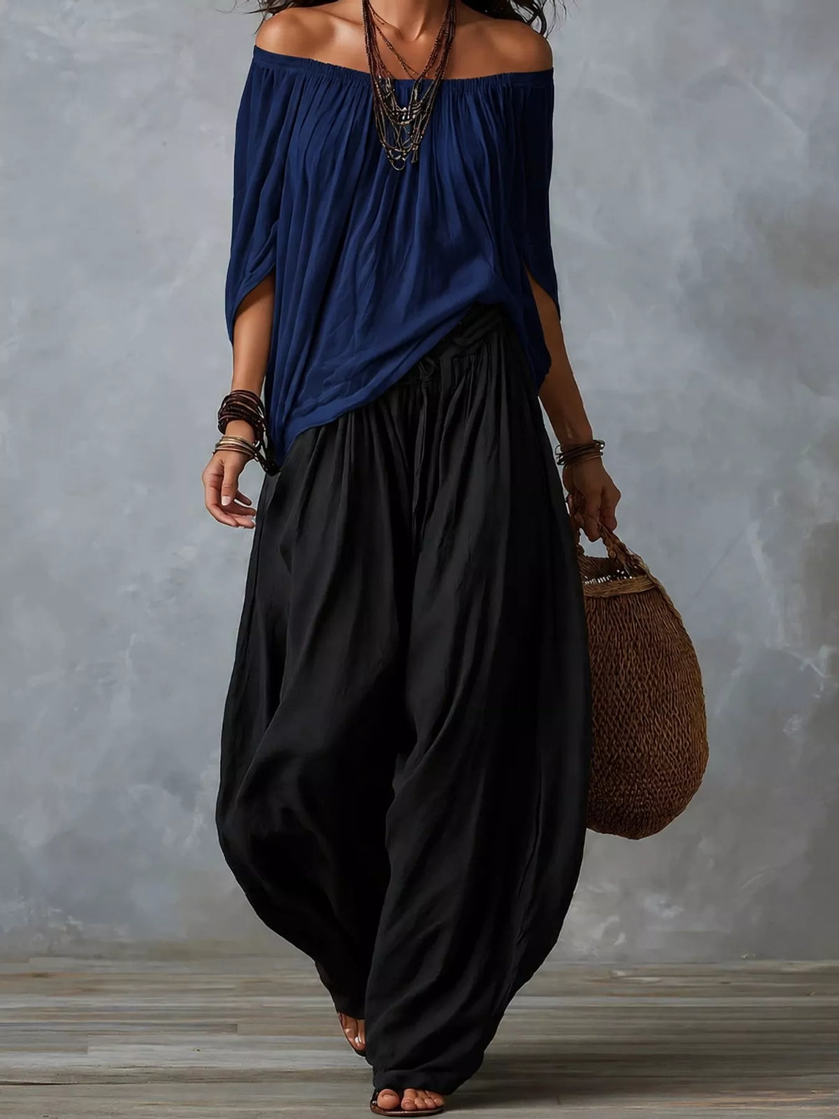 Navy top and black pants off-shoulder top and wide-leg harem pants set — front view