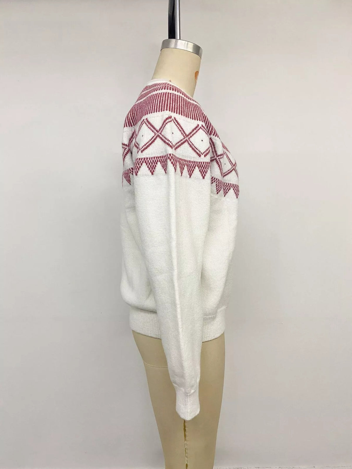Cream geometric crew neck sweater, side on mannequin