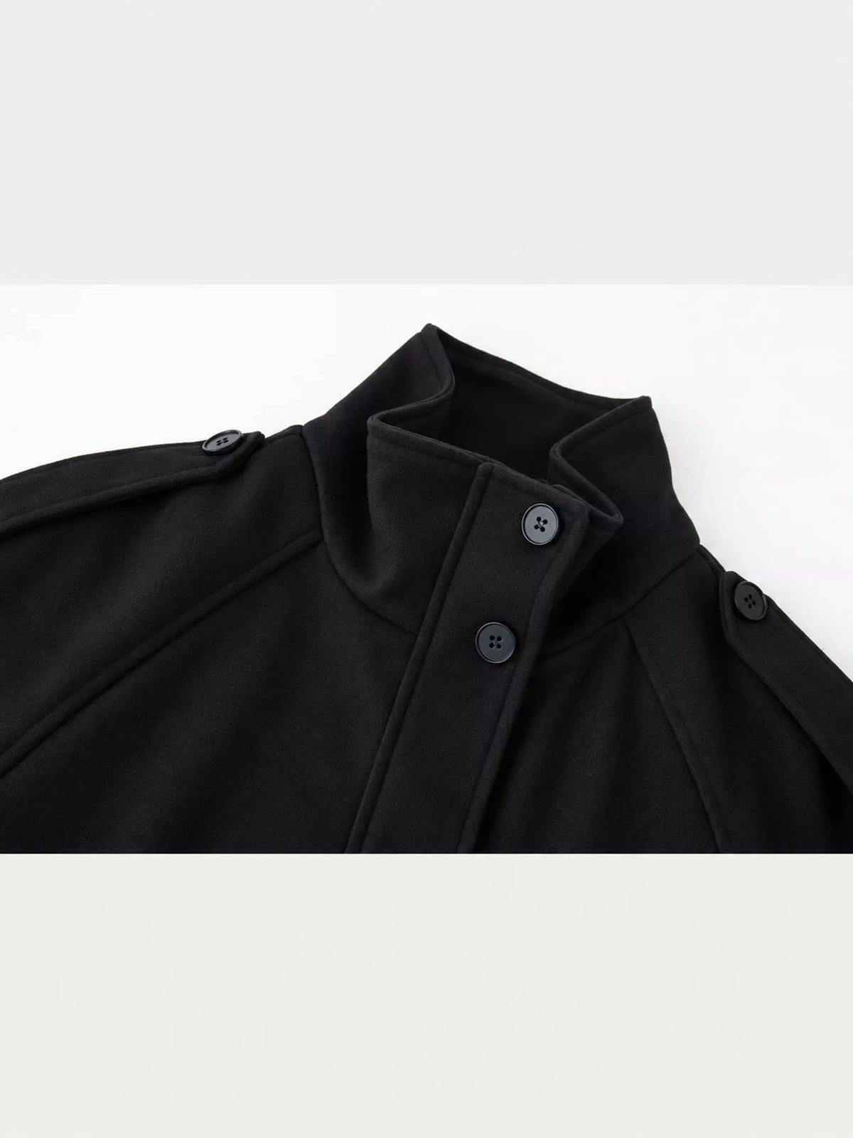 Black zip-up stand-collar jacket — design and construction details