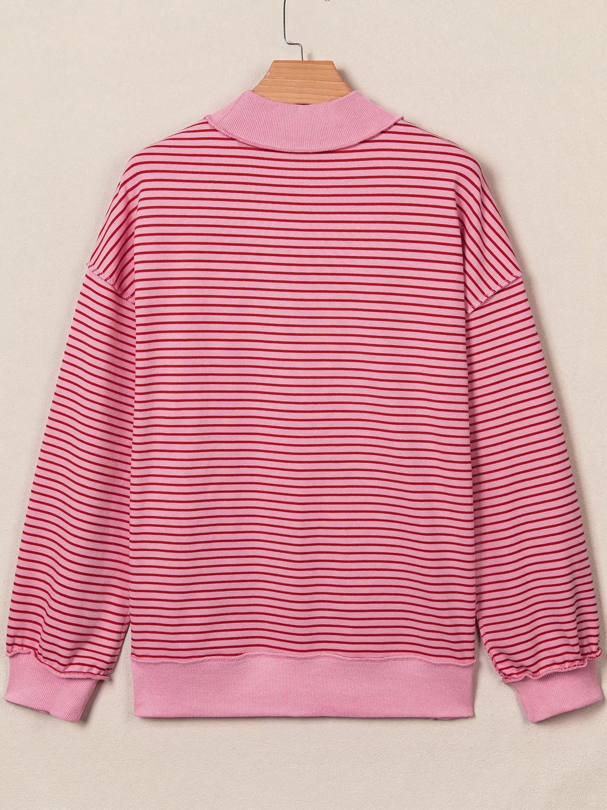 Pink and red striped striped color-block mock neck sweatshirt — back view