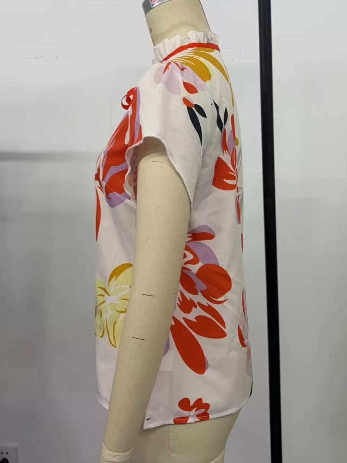 Contrast Trim Ruffle Sleeve Tie-Front Blouse in white with multicolor floral print