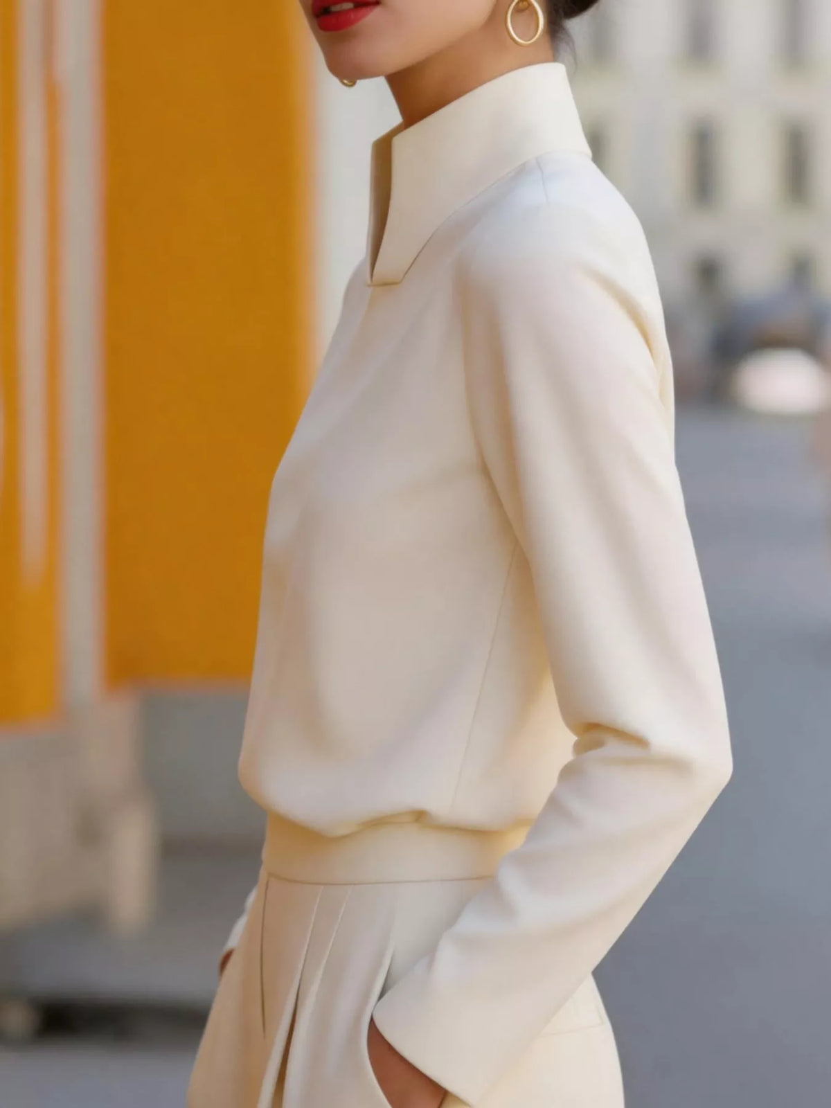 Mandarin neck long sleeve blouse, side view