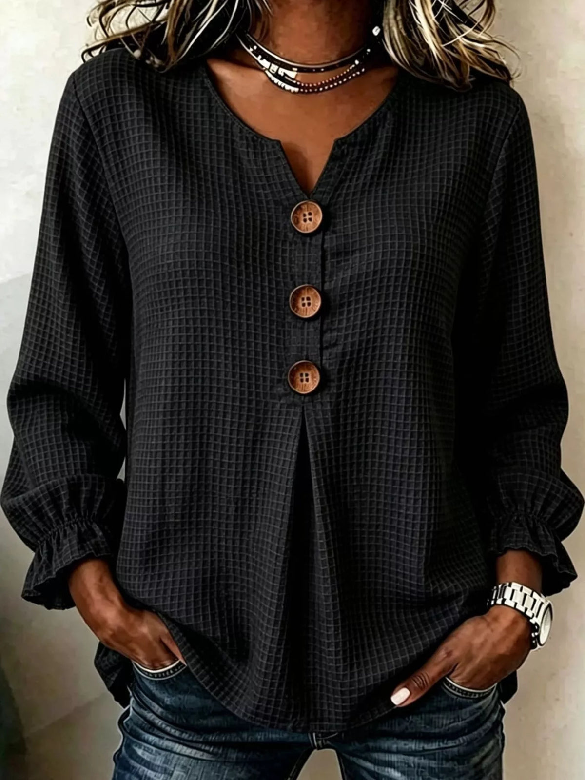 Women's Waffle Knit Flounce Sleeve Blouse in black — front view
