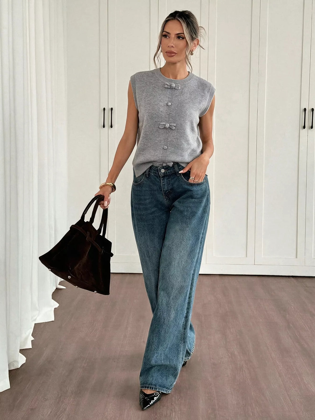 Gray bow-detail knit sweater vest, full-length outfit view