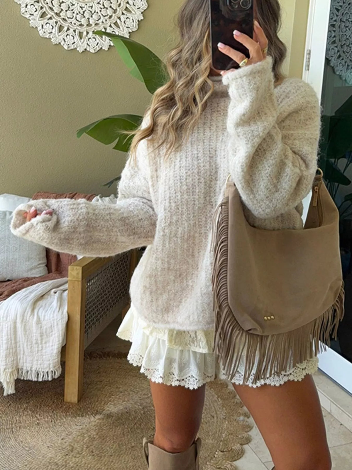 Cream mock-neck chunky-knit sweater, front view in mirror