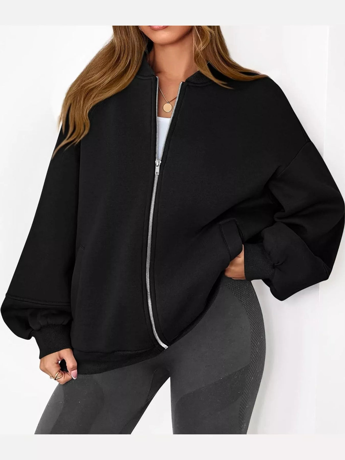 Black oversized zip-up jacket — front view