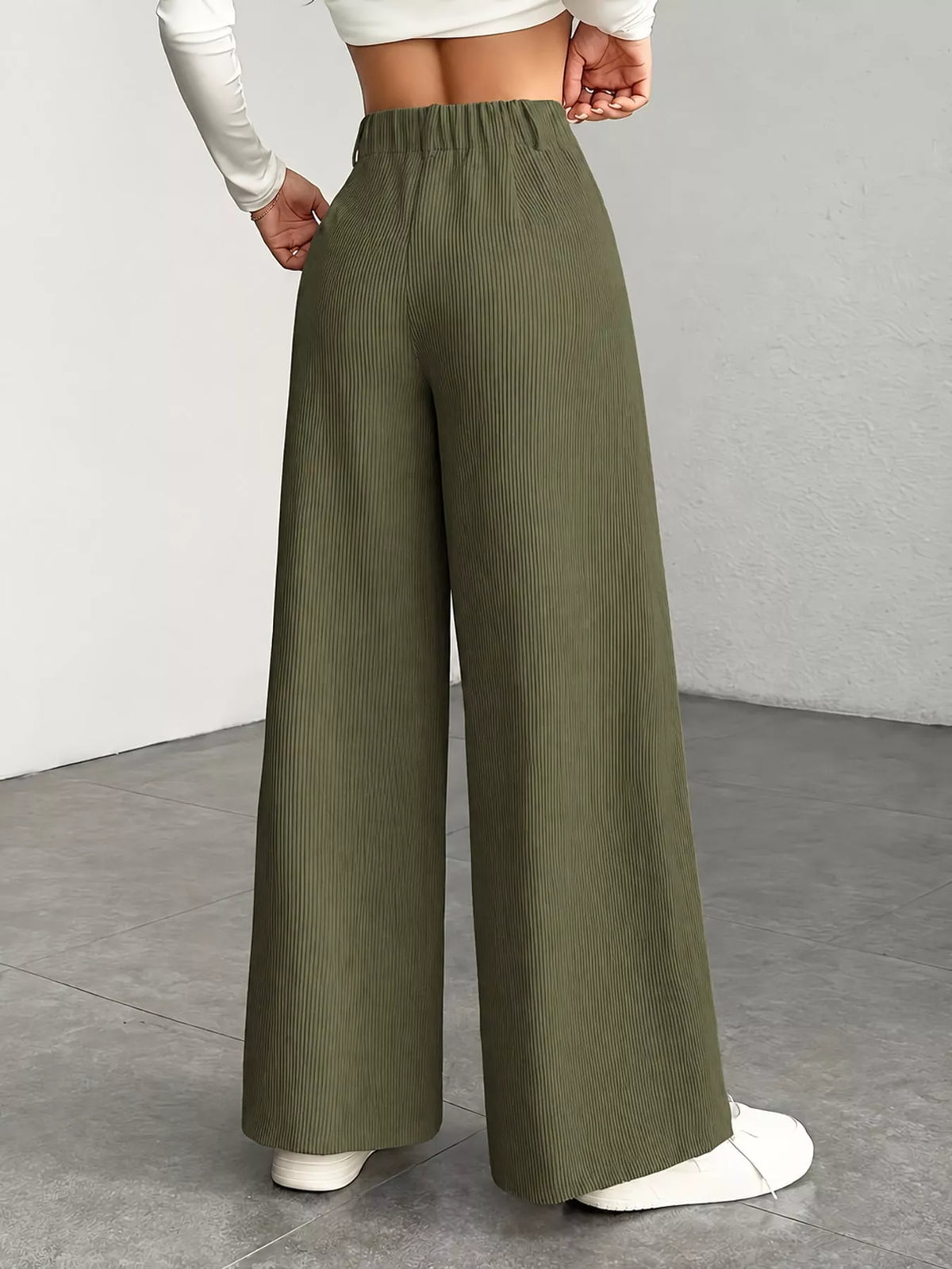 Green high-waisted wide-leg pants, back view