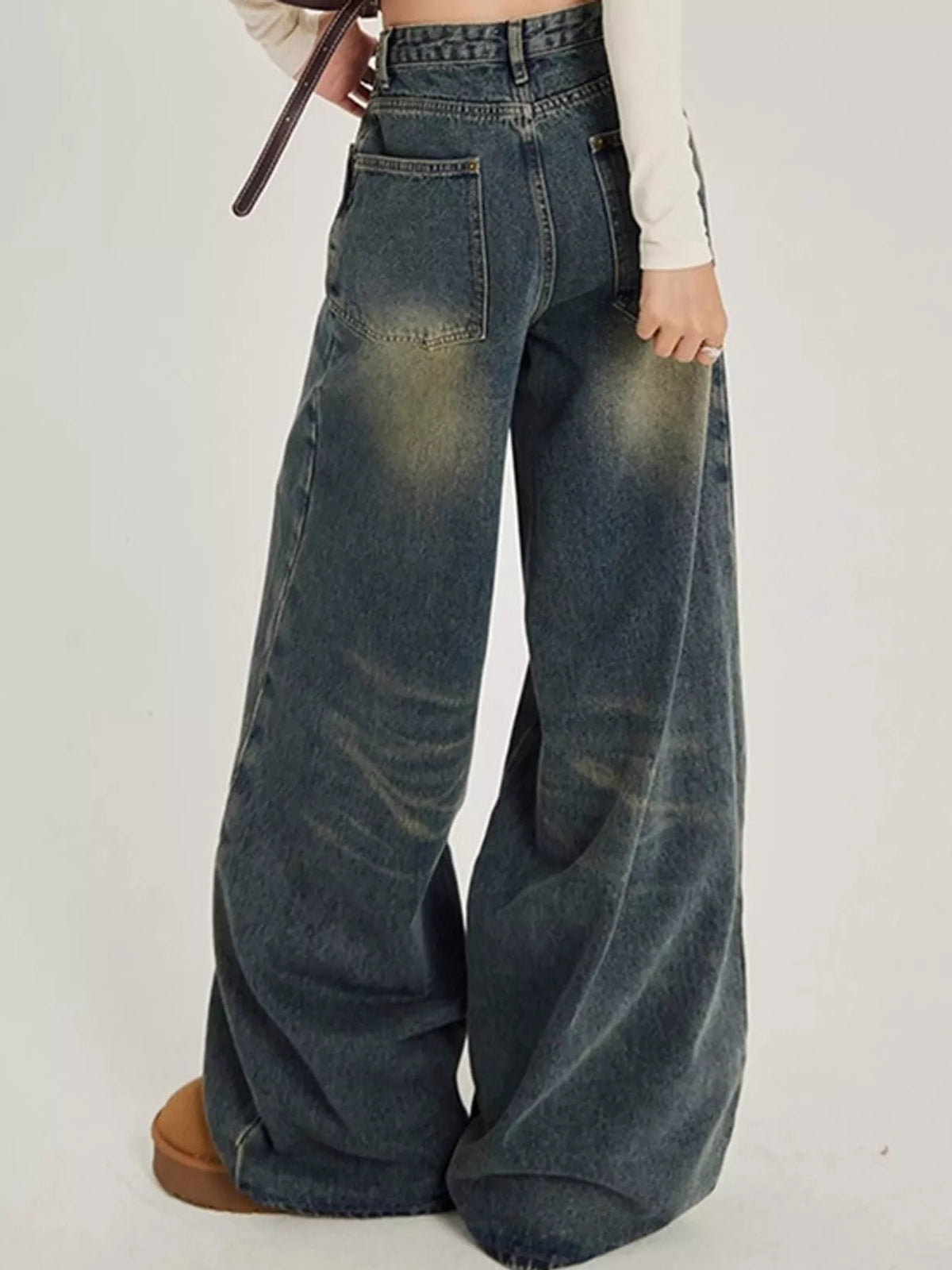 Washed blue high-waisted wide-leg jeans, back view