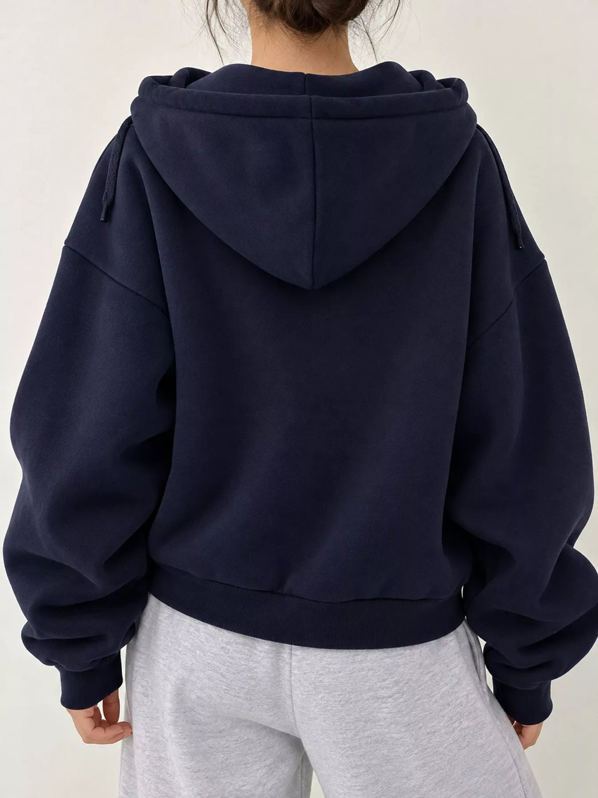 Navy oversized zip-up cropped hoodie, back view