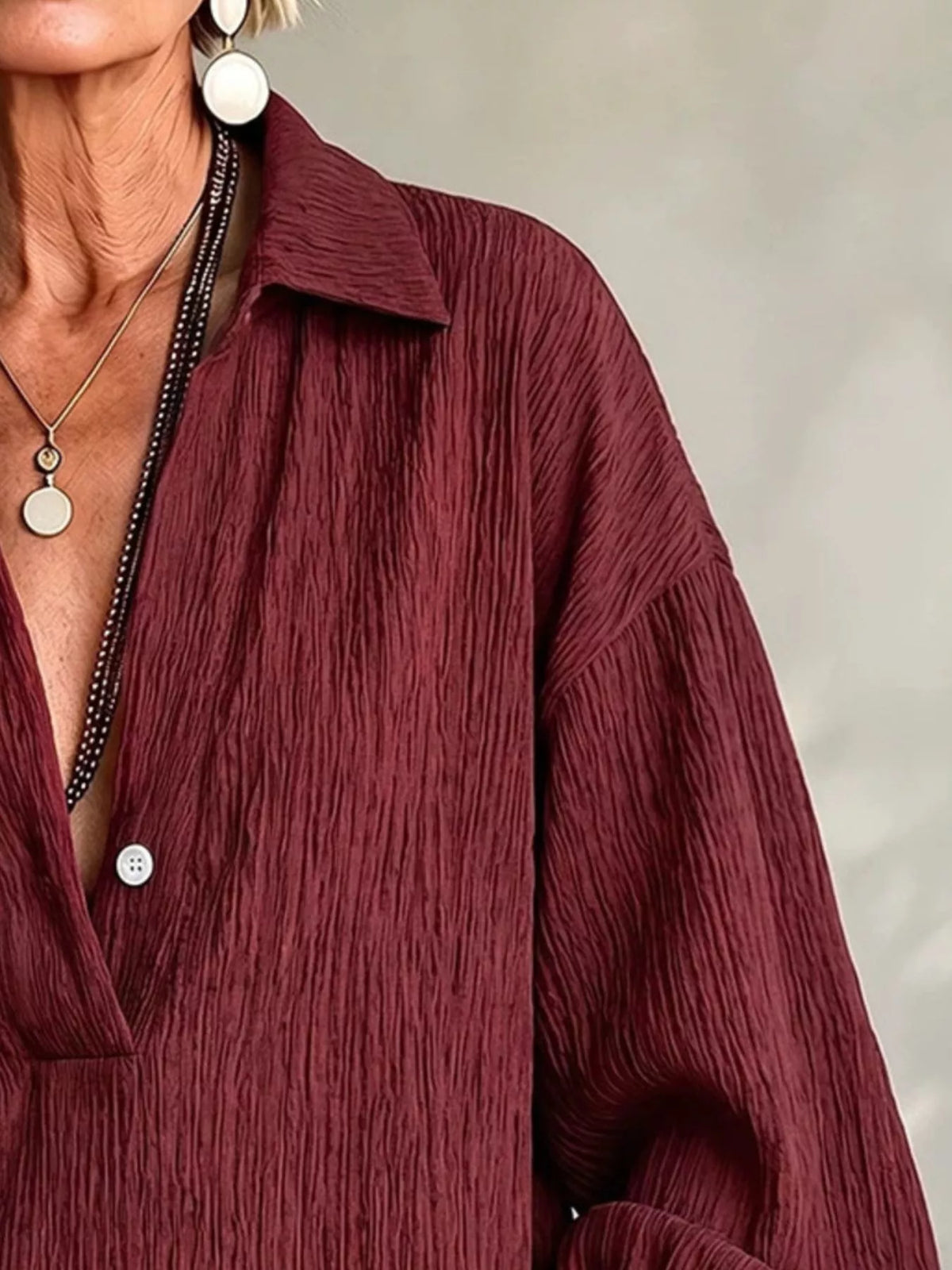 Women's Textured Lantern Sleeves Blouse in burgundy — neckline detail view