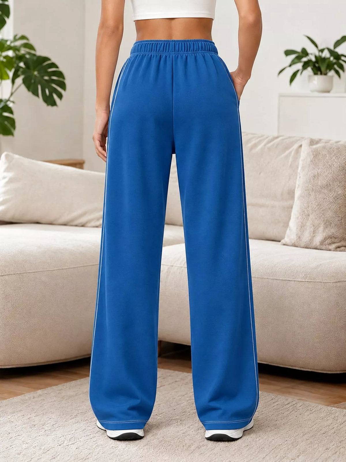 Blue wide-leg pants with drawstring, back view