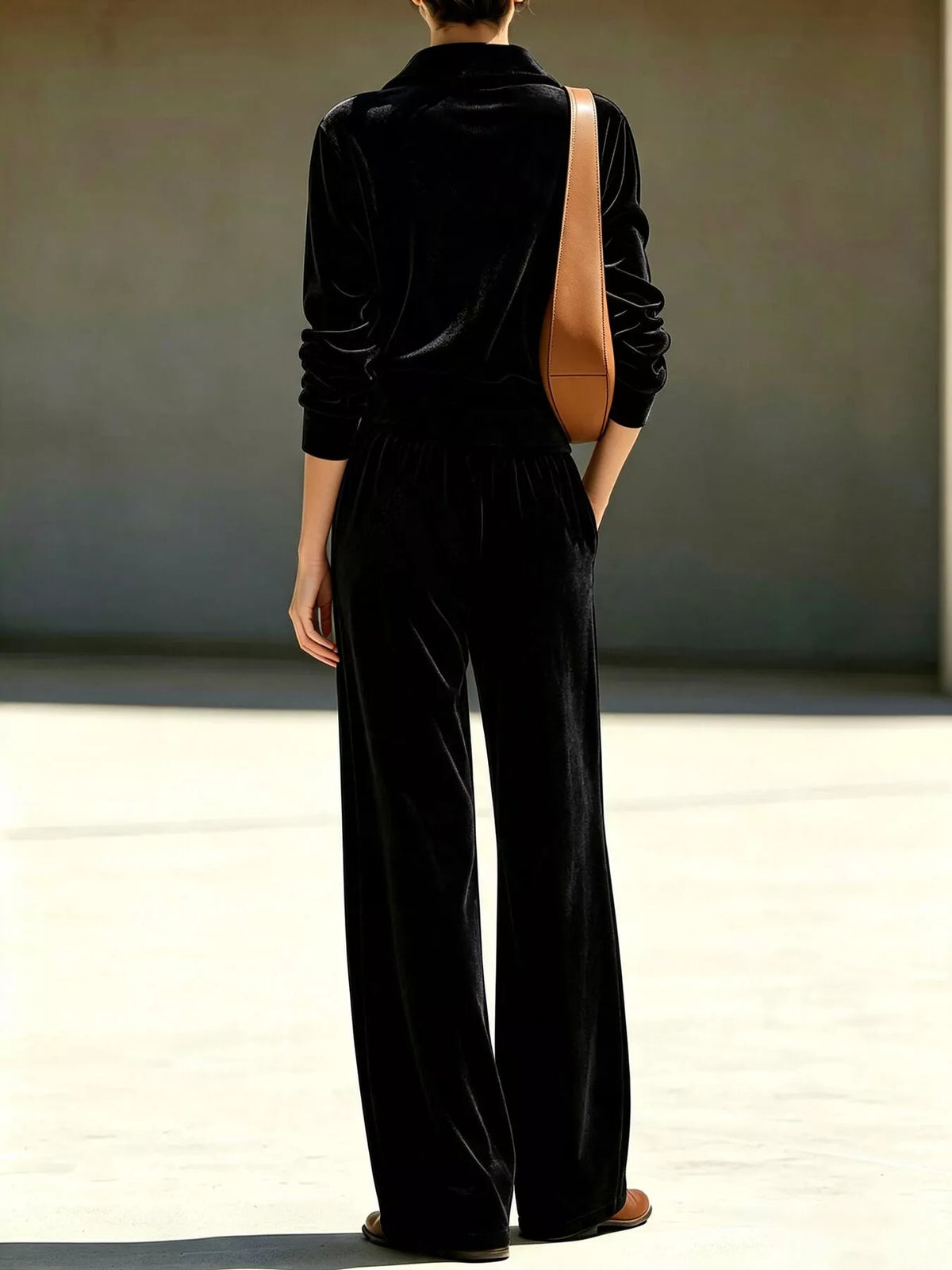 Black quarter-zip top and wide-leg pants set, back view
