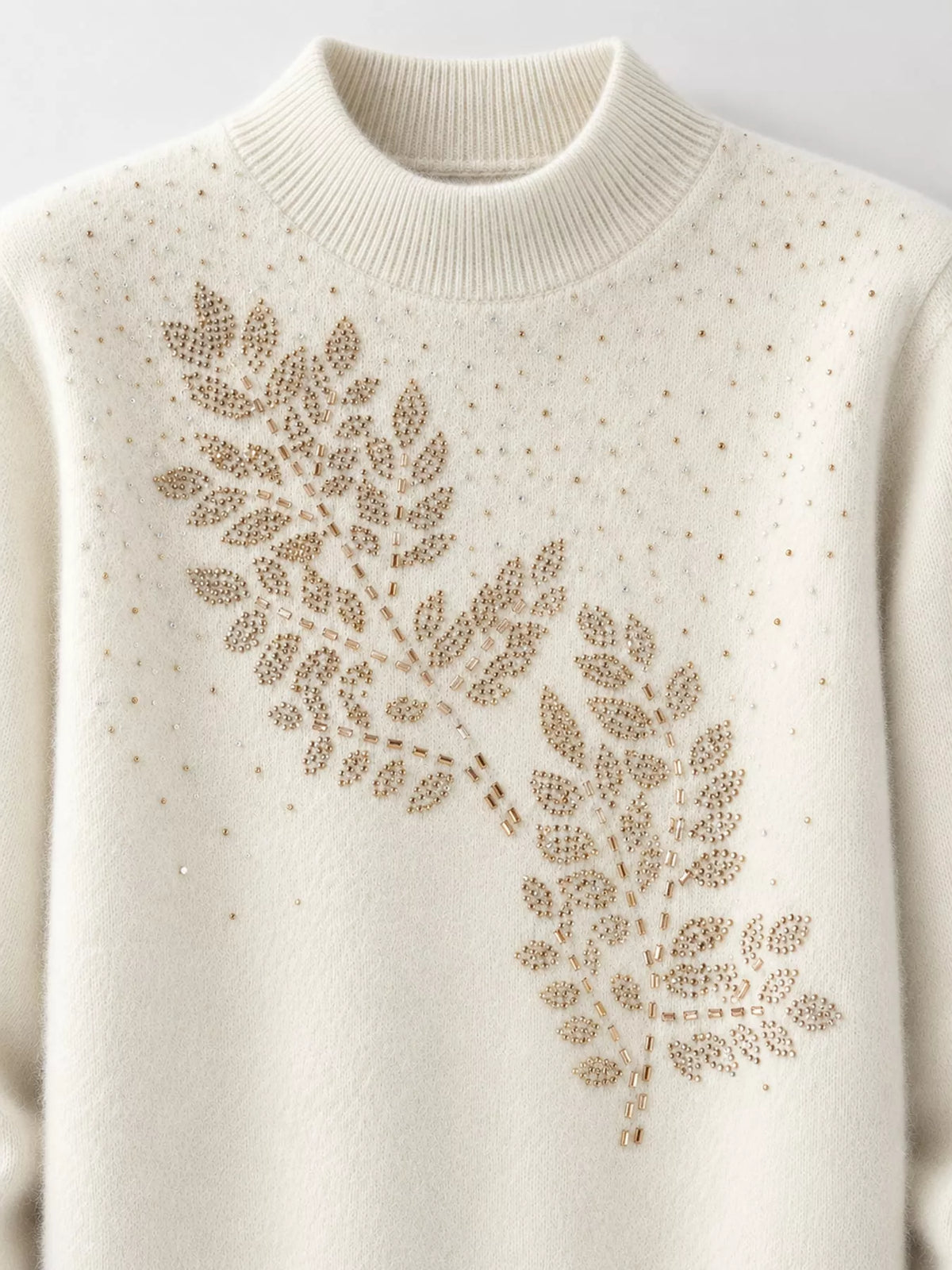 Rhinestone Leaf Mock Neck Sweater — construction details