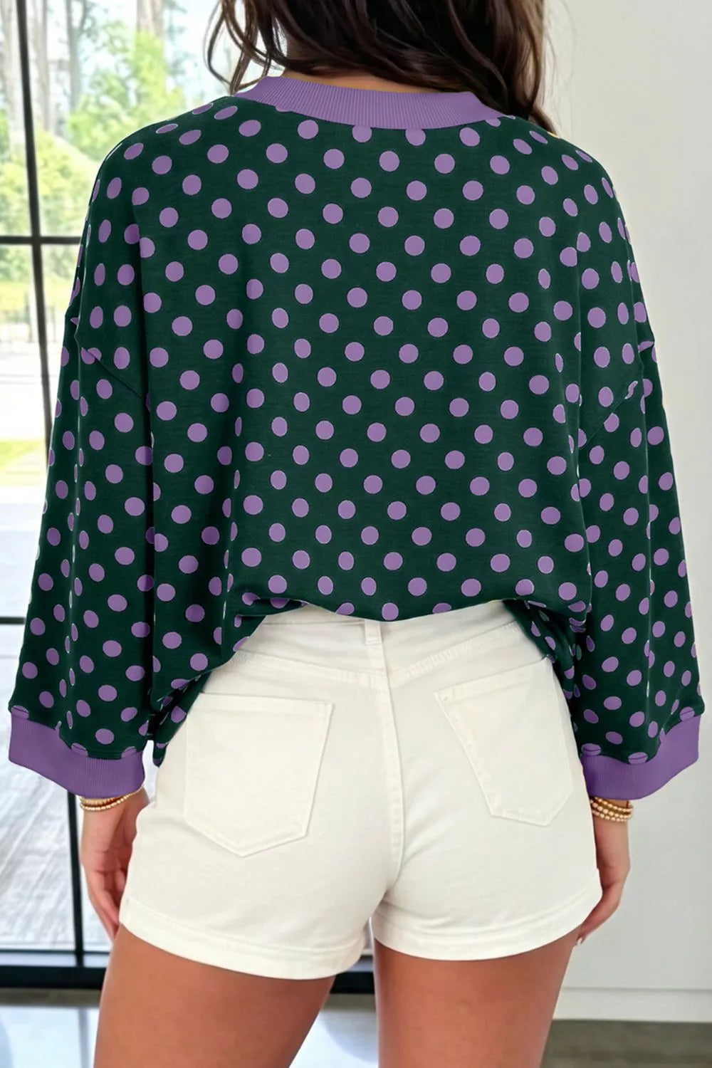 Polka Dot Sweatshirt in green with purple dots, back view