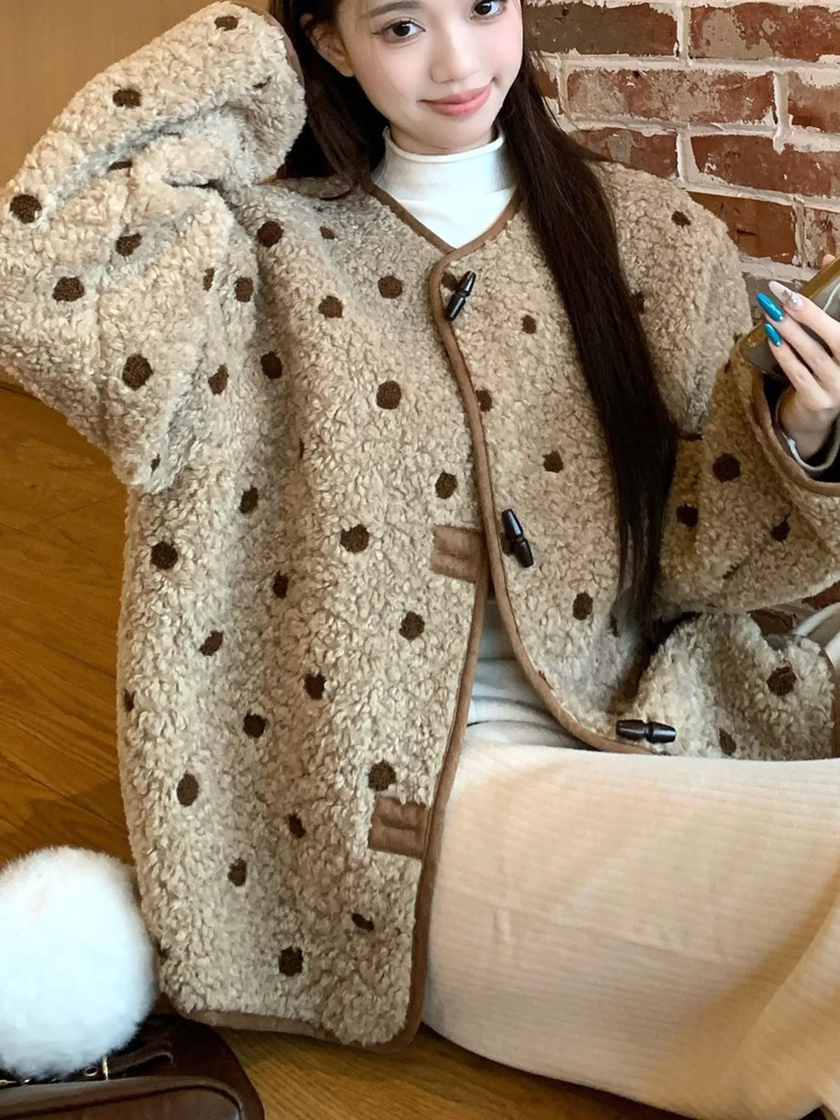Beige with brown polka dots polka dot toggle jacket, front view