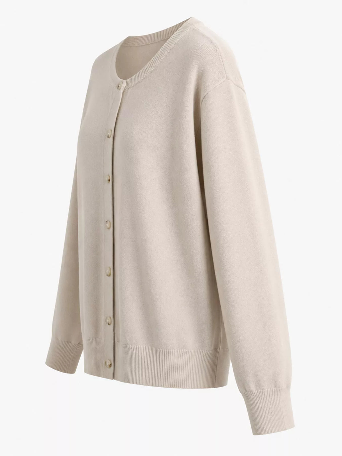Cream crew neck button down knit cardigan, side view