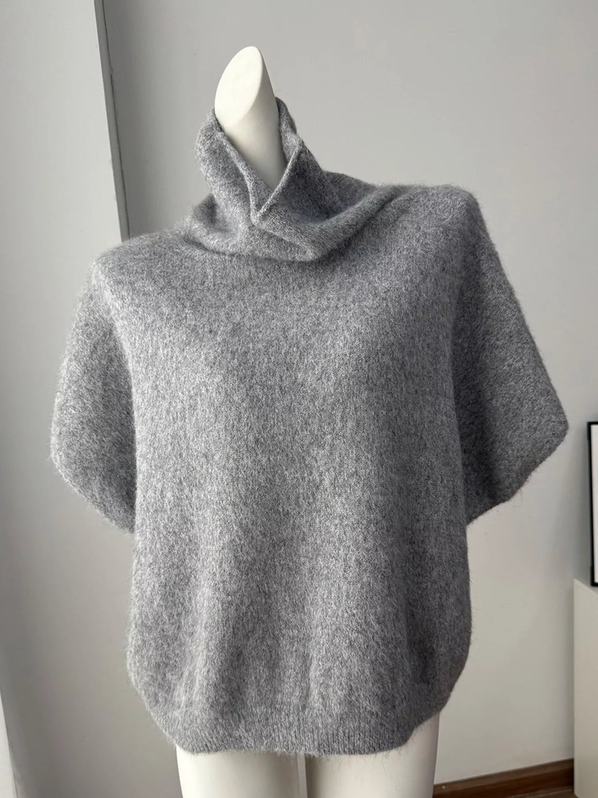 Fuzzy short-sleeve turtleneck sweater in gray, front mannequin view