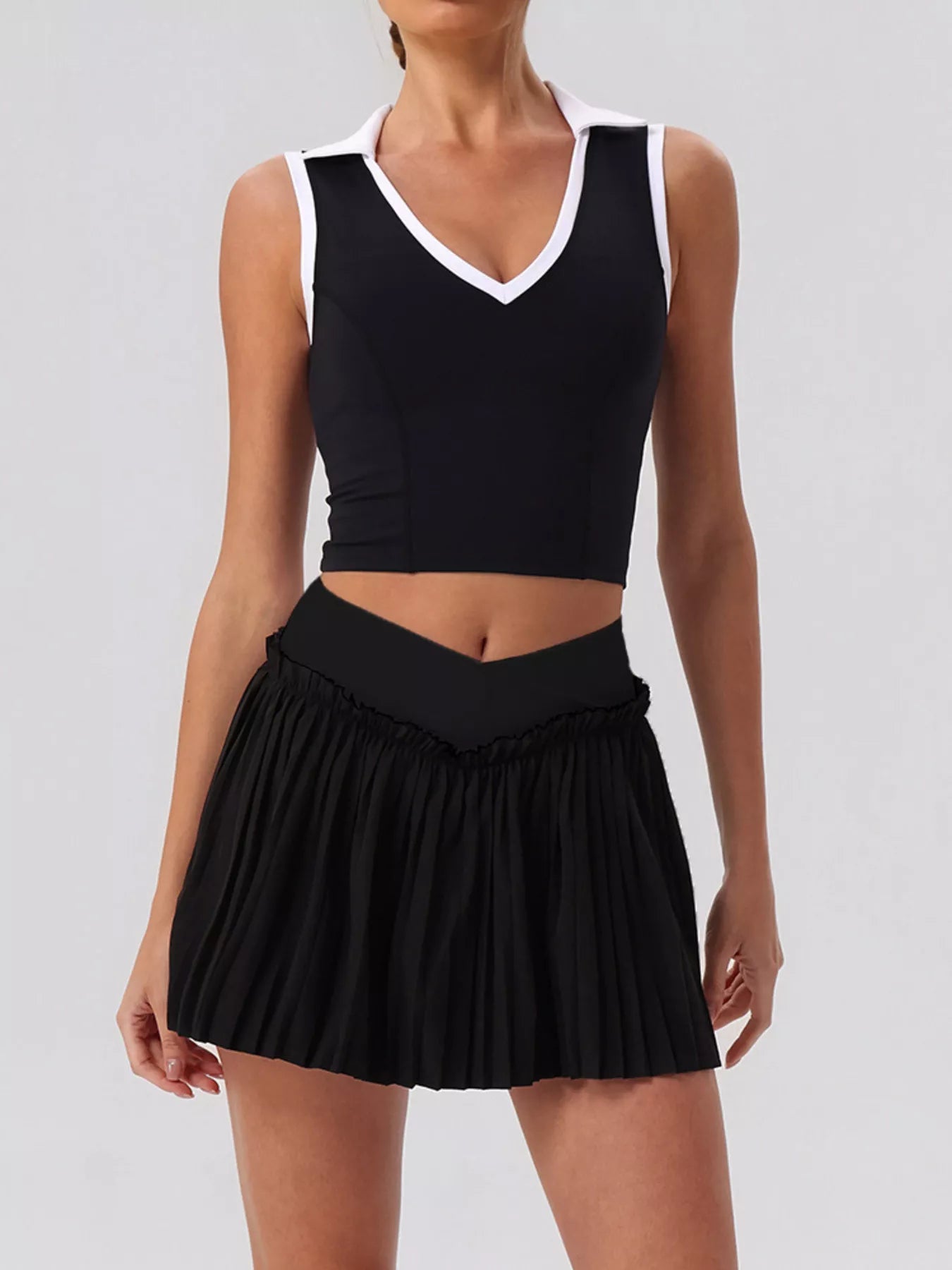 Trendsi Sleeveless Top and Pleated Skirt Active Set -