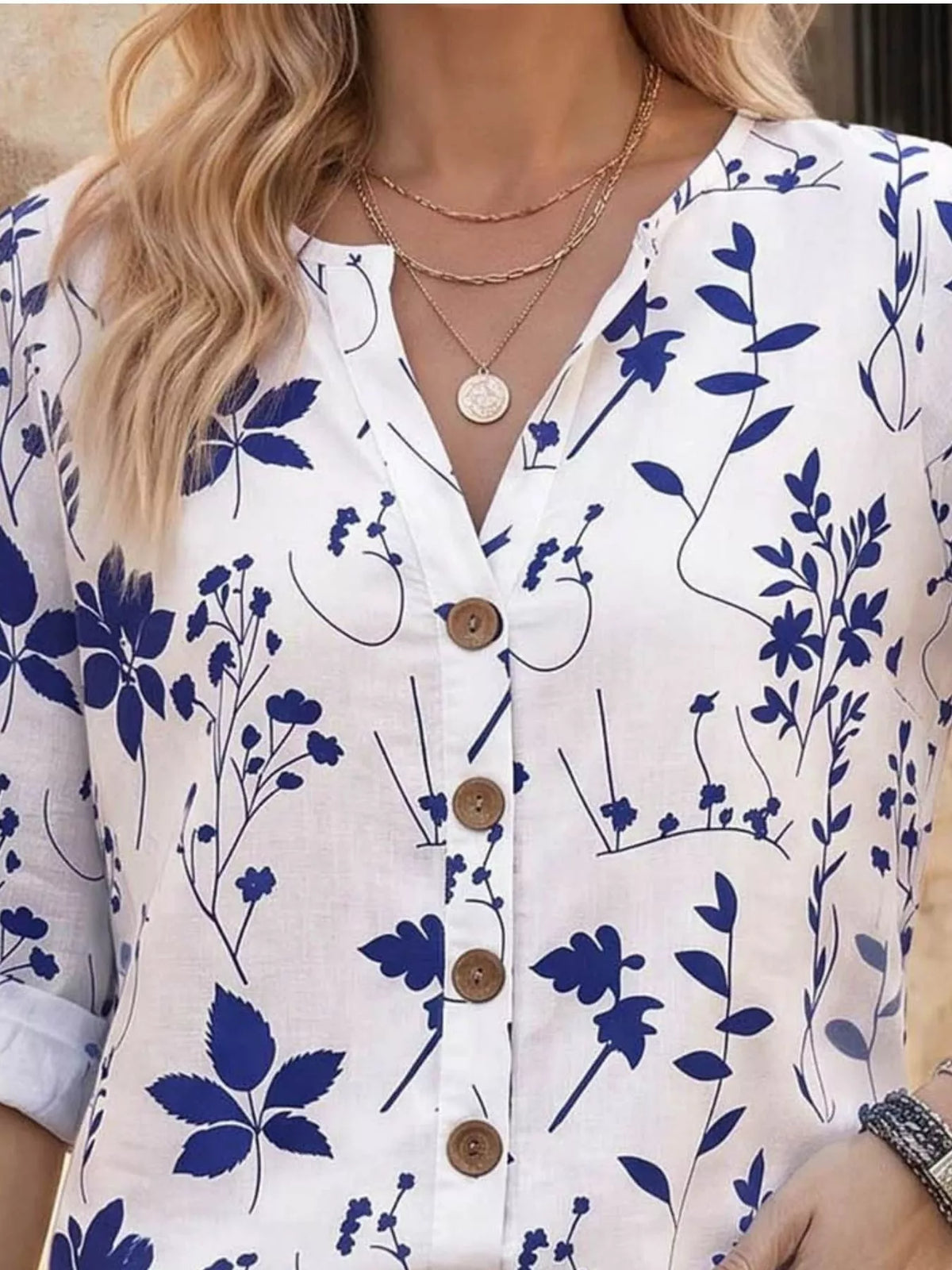 Notched-neck shirt, white blue-floral neckline
