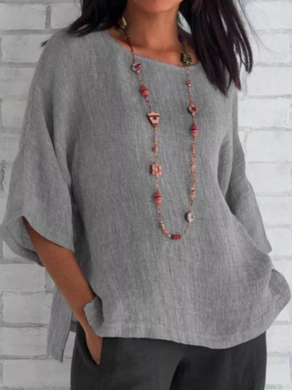 Slit blouse, gray front